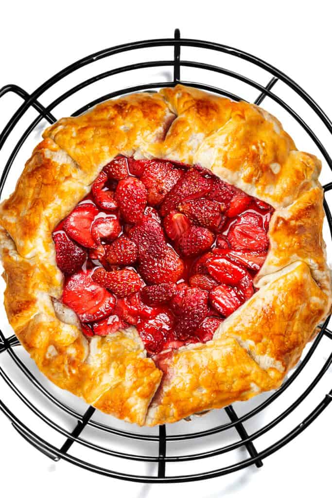 the baked Strawberry Galette cooling on a cooling rack.