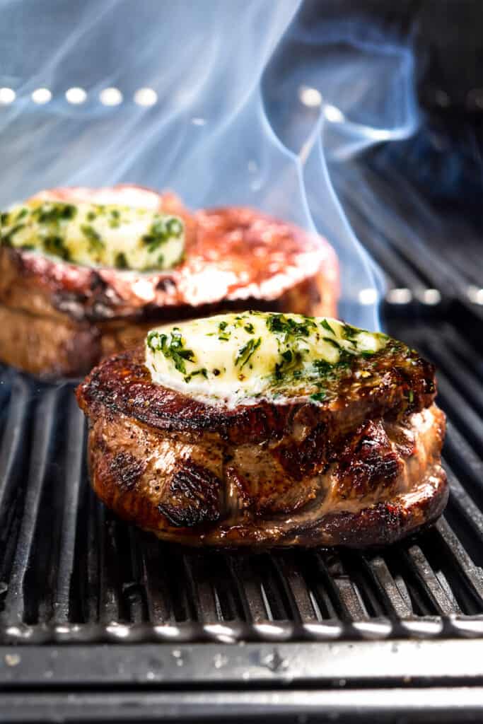 herb and garlic butter added to the Grilled Filet Mignon on the grill.