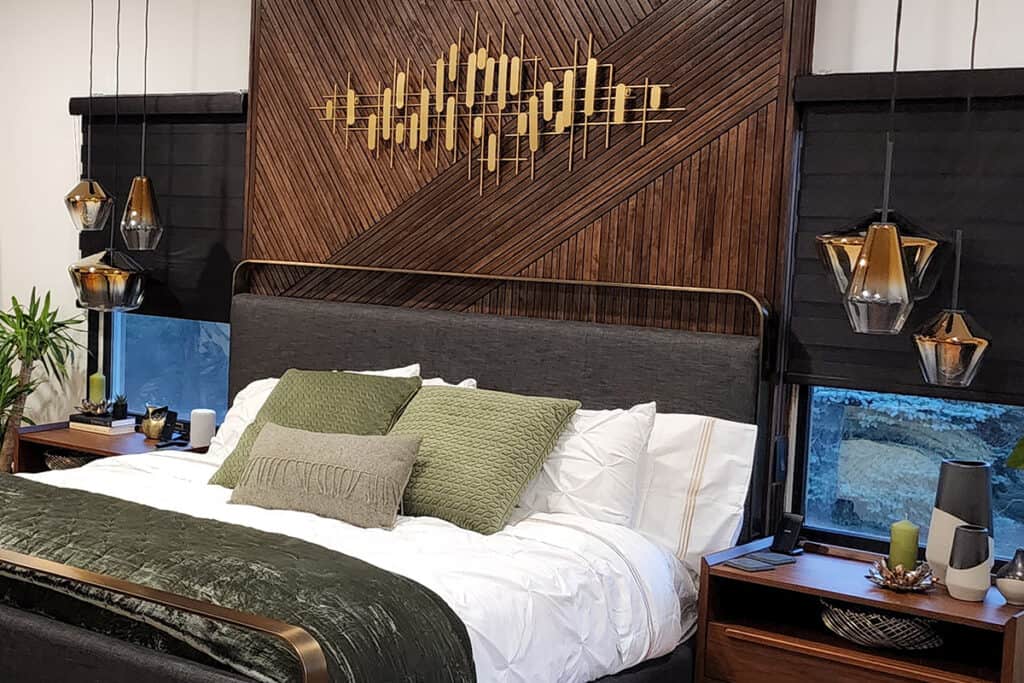 a photo showing accent lighting hanging over the nightstands.