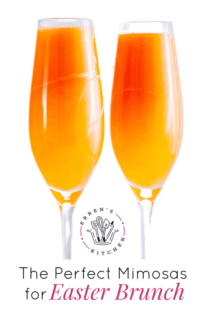 2 champagne glasses with orange mimosa in them.
