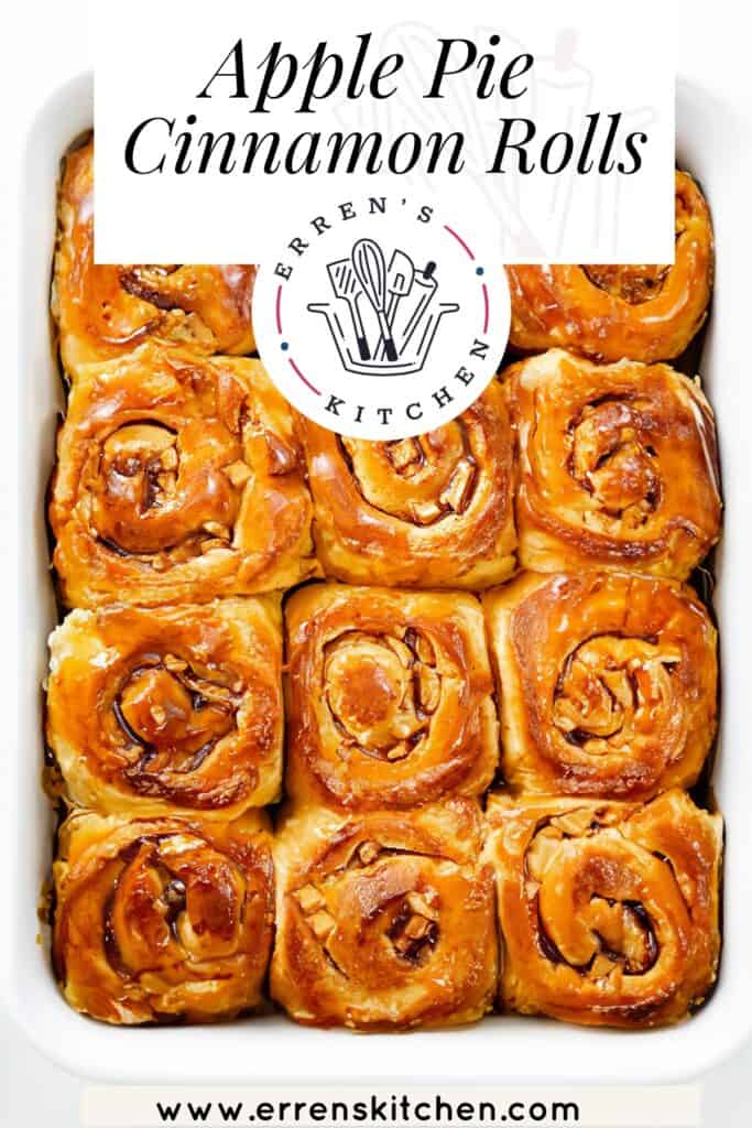 A tray of apple pie cinnamon rolls with a golden-brown glaze, featuring the logo 'Erren's Kitchen' and the text 'Apple Pie Cinnamon Rolls' above, with the website 'www.errenskitchen.com' at the bottom.
