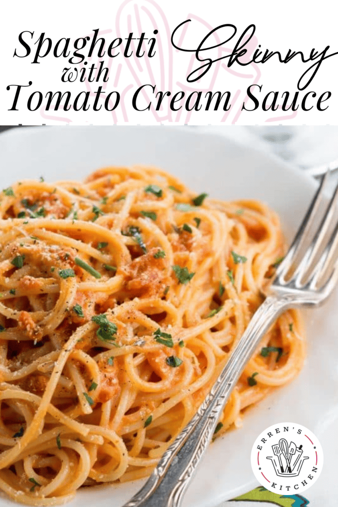 A plate of spaghetti with low fat, creamy tomato sauce topped with fresh parsley.