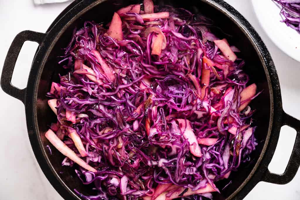 The cabbage mixture in the pot ready to braise.