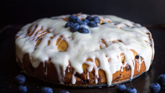 A blueberry coffee cake with heavy glaze.