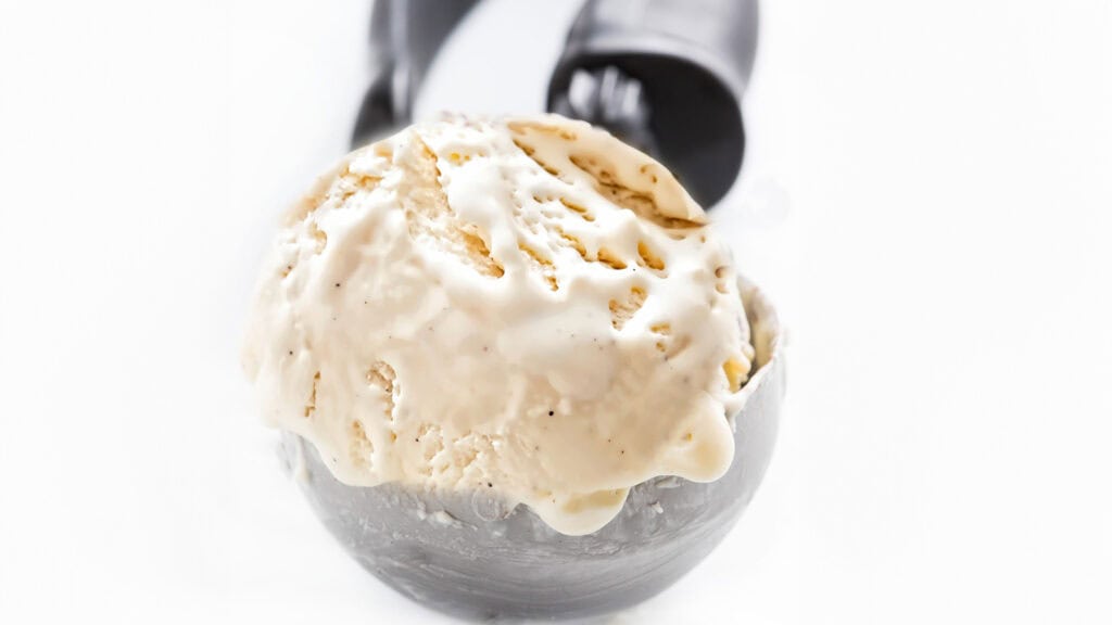Vanilla Ice Cream in an ice cream scoop.
