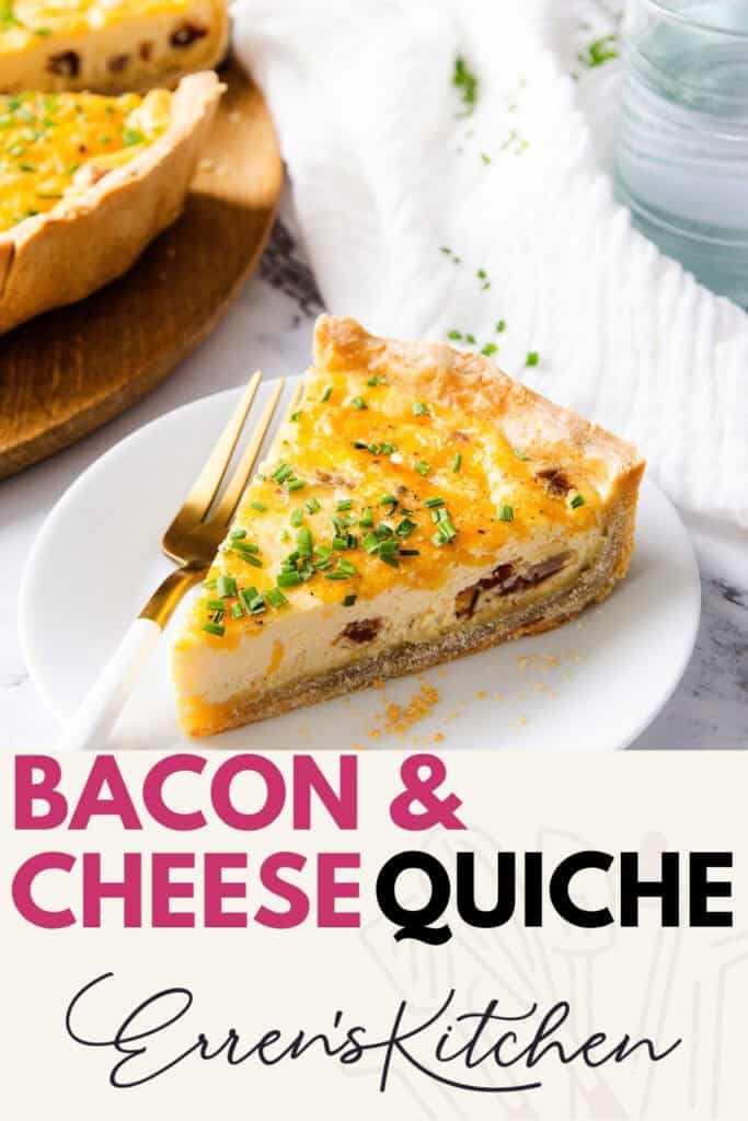A slice of Bacon and Cheese Quiche, garnished with chopped chives, sits on a white plate with a fork, next to a glass of water and a white napkin. The rest of the Bacon and Cheese Quiche is in the background. Text reads: "Bacon & Cheese Quiche.