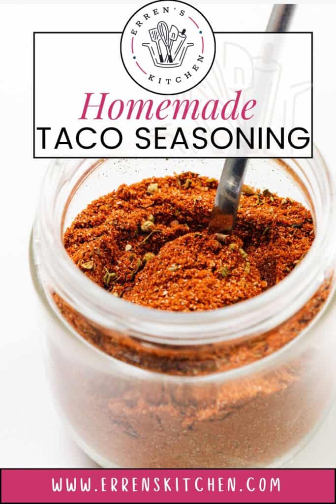 A glass jar filled with homemade taco seasoning for Ground Beef Tacos With Homemade Taco Seasoning, a spoon inside. The label reads "Homemade Taco Seasoning" and "Erren's Kitchen," with www.errenskitchen.com at the bottom.