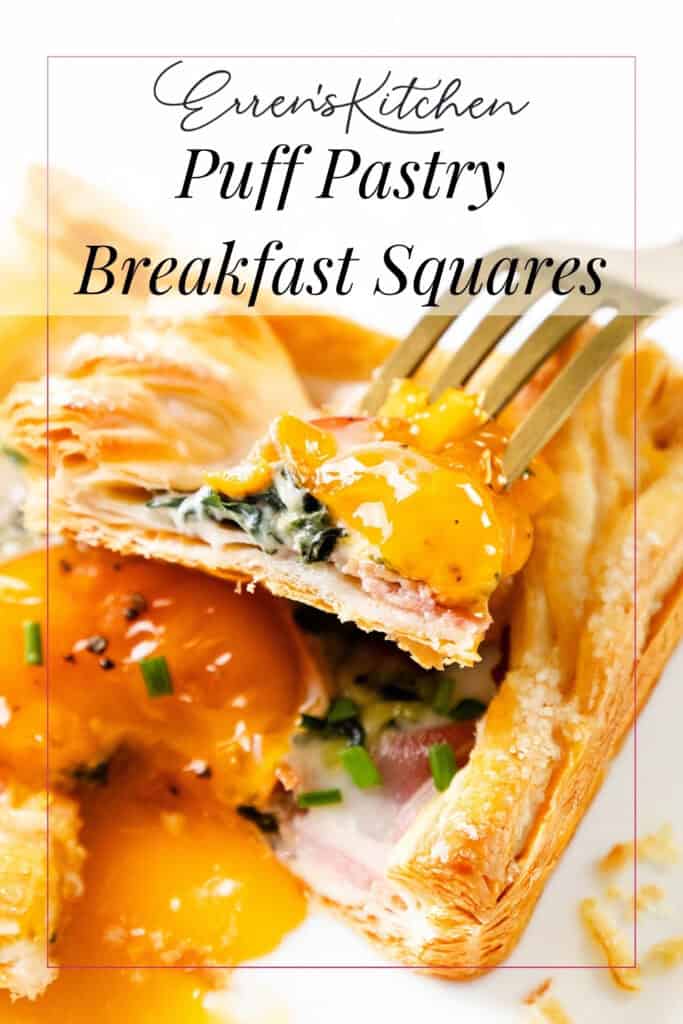 A close-up of a puff pastry breakfast square topped with runny egg yolk, spinach, prosciutto, and chives, with a fork cutting in. Text overlay reads: "Erren's Kitchen Puff Pastry Breakfast Squares.