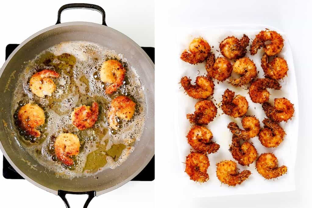 Fried shrimp, perfect for a coconut shrimp recipe, rest on paper towels to drain excess oil and are arranged in rows on a white surface, ready for sweet chili dip.