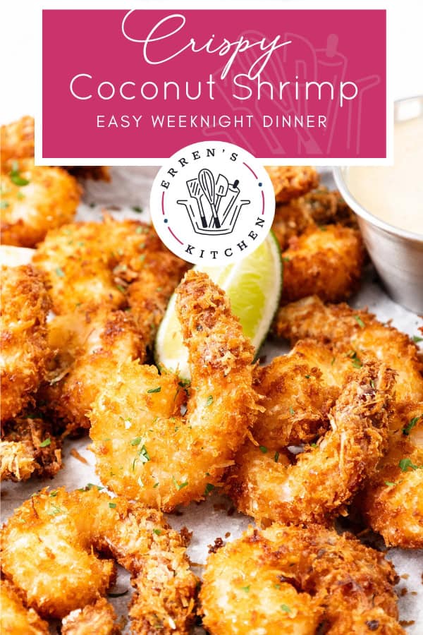 A plate of crispy coconut shrimp garnished with herbs, served with a lime wedge and sweet chili dipping sauce. Text overlay reads: "Crispy Coconut Shrimp. Easy weeknight dinner. Erren's Kitchen.