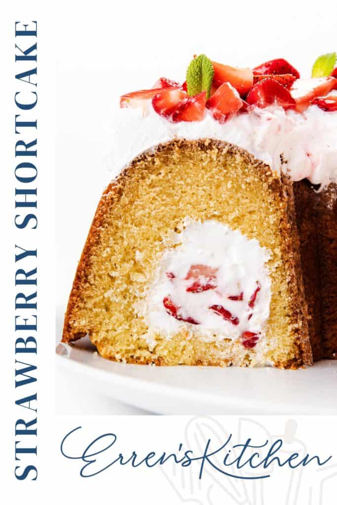 A slice of Strawberry Shortcake Filled Bundt Cake, with whipped cream and strawberries inside, topped with more whipped cream, sliced strawberries, and mint leaves. Text on the side reads “Strawberry Shortcake” and “Erren's Kitchen.”.