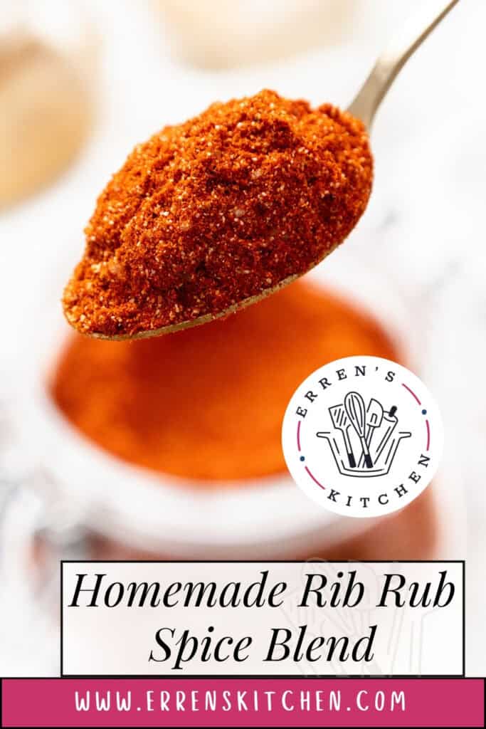 A spoonful of reddish-brown rib rub spice mix is held above a glass jar. Text reads: "Homemade Rib Rub Spice Blend" and "www.errenskitchen.com" with the Erren's Kitchen logo.