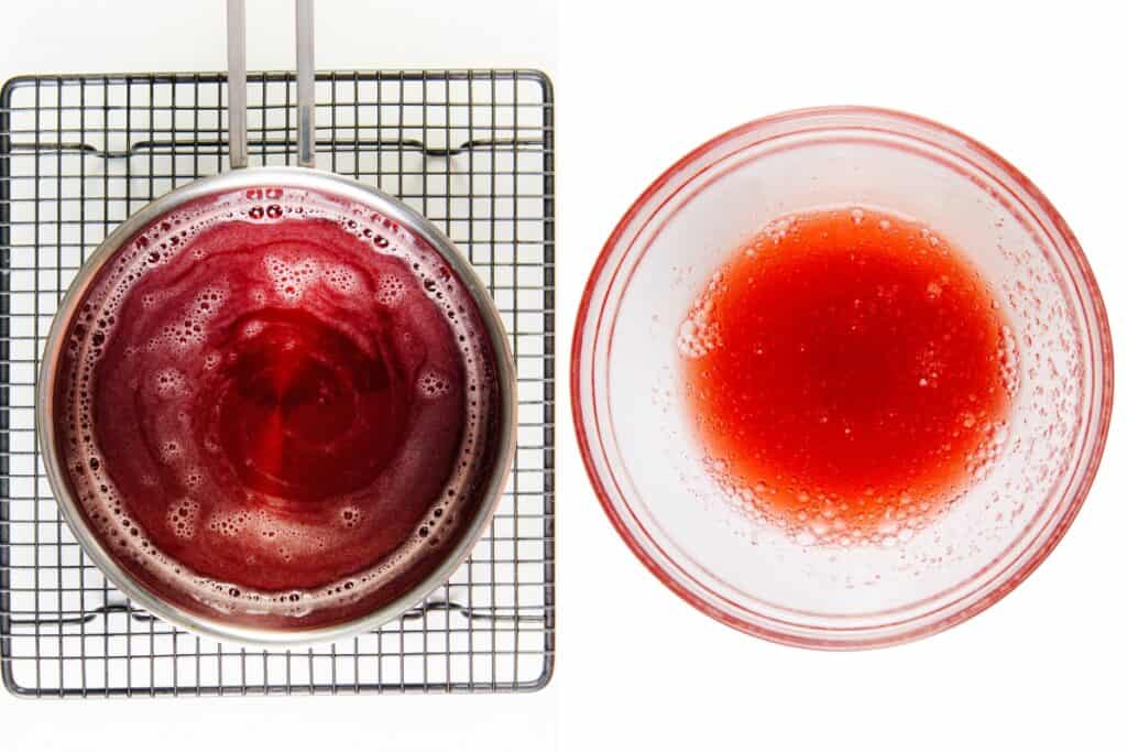 A saucepan with red liquid for strawberry pretzel salad rests on a cooling rack beside a clear bowl of red, slightly frothy liquid, both viewed from above on a white background.