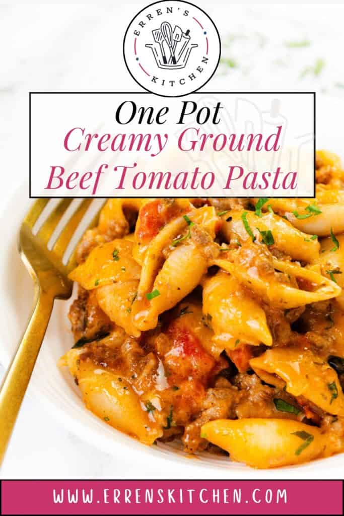 A plate of creamy tomato ground beef pasta shells garnished with herbs, a fork on the side. Text reads: "One Pot Creamy Ground Beef Tomato Pasta. www.errenskitchen.com.