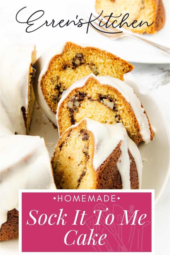 A plate with sliced homemade Sock It To Me Cake, a classic bundt cake topped with white icing and filled with a cinnamon-nut swirl. The text reads "Erren’s Kitchen" and "Homemade Sock It To Me Cake Recipe.