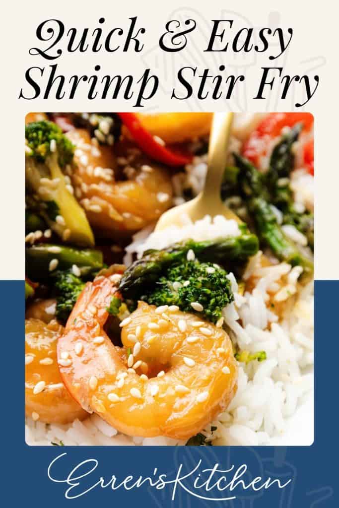 Close-up of Easy Shrimp Stir Fry with broccoli, asparagus, red bell peppers, and sesame seeds over white rice. Text reads, "Quick & Easy Shrimp Stir Fry. Erren's Kitchen.