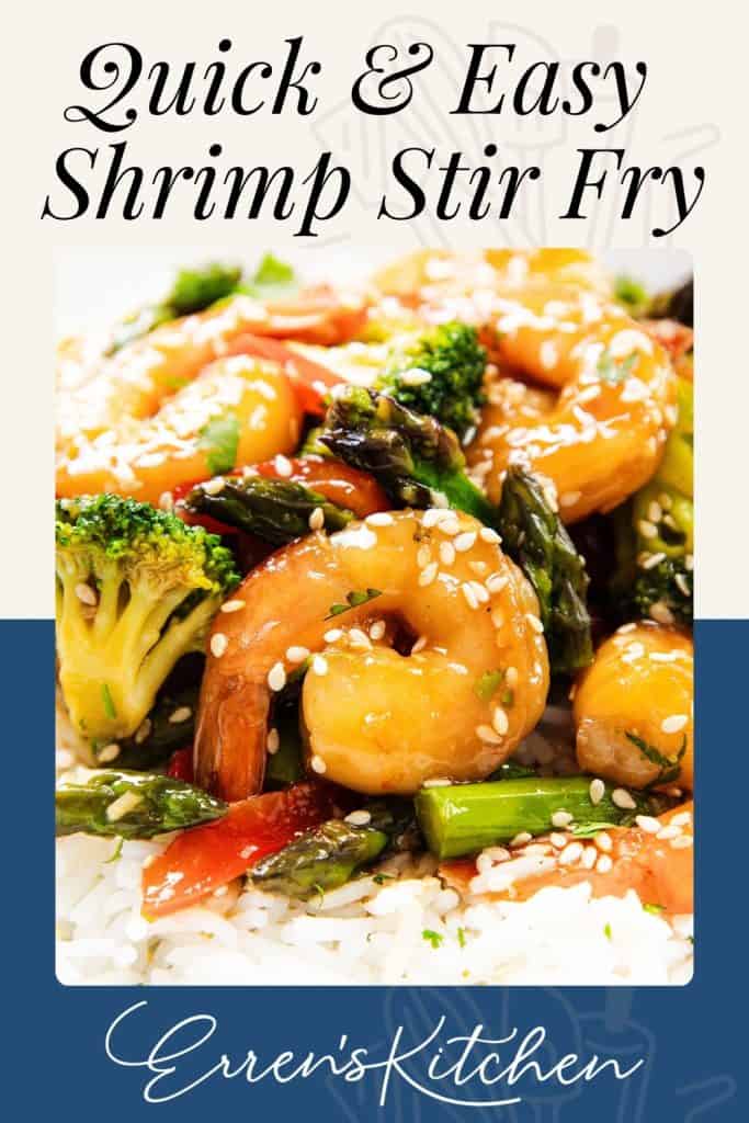 Close-up of Shrimp Stir Fry with broccoli, asparagus, and red peppers over white rice, topped with sesame seeds. Text reads “Quick Seafood Dinner” and “Erren’s Kitchen.”.