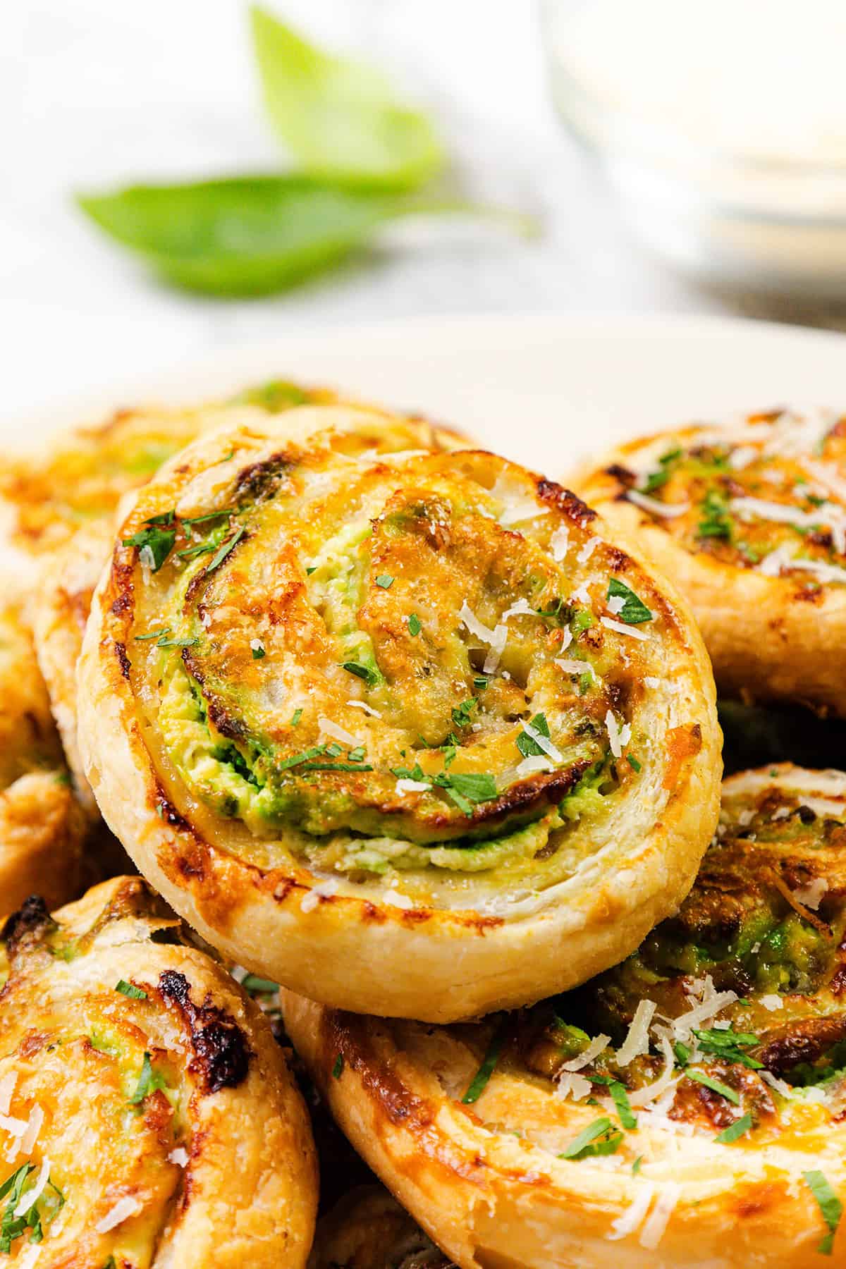 Puff Pastry Pinwheel Appetizer with Pesto Cream Cheese & Prosciutto