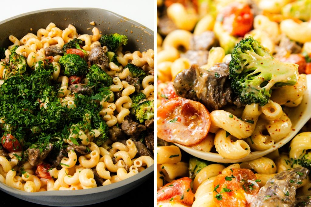 A skillet filled with creamy steak pasta, featuring curly noodles, beef strips, broccoli, and cherry tomatoes, all garnished with fresh herbs. A close-up highlights the vibrant vegetables and tender beef in this savory mix.