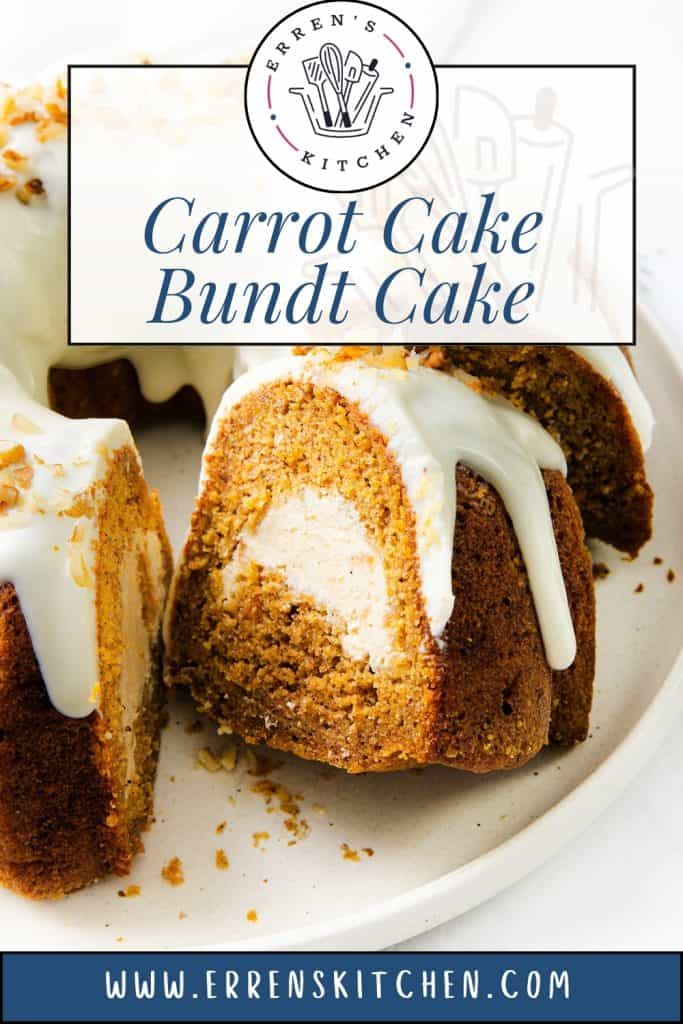 A sliced Carrot Cake Bundt Cake with white icing and cream cheese filling, served on a white plate. Crumbs and chopped nuts are scattered around. Text over the image reads "Carrot Cake Bundt Cake" and "www.errenskitchen.com".