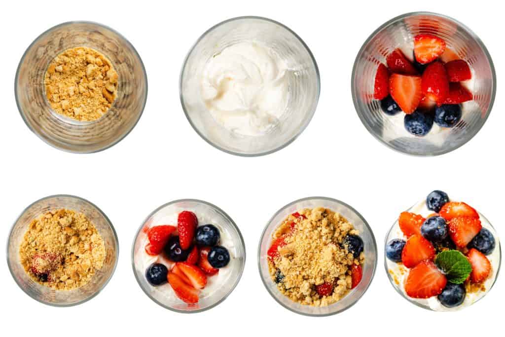 Seven glass bowls shown from above, displaying stages of making Lemon Cream Parfaits: starting with crumbled crust, followed by lemon cream, then layers of mixed berries and crumble, and ending with a berry-topped parfait garnished with mint.