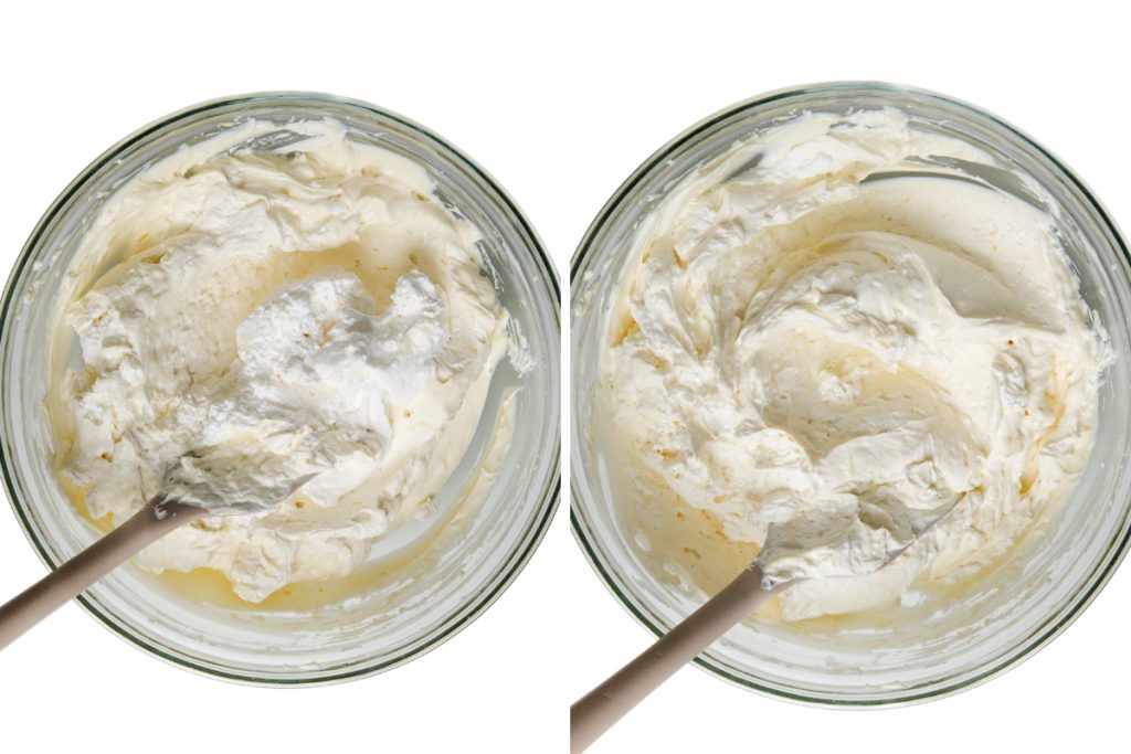 Two glass bowls seen from above, both containing a creamy white mixture for a No-Bake Cheesecake being stirred with a spatula. The left bowl has some powdered sugar on top; the right one shows this easy dessert fully mixed.