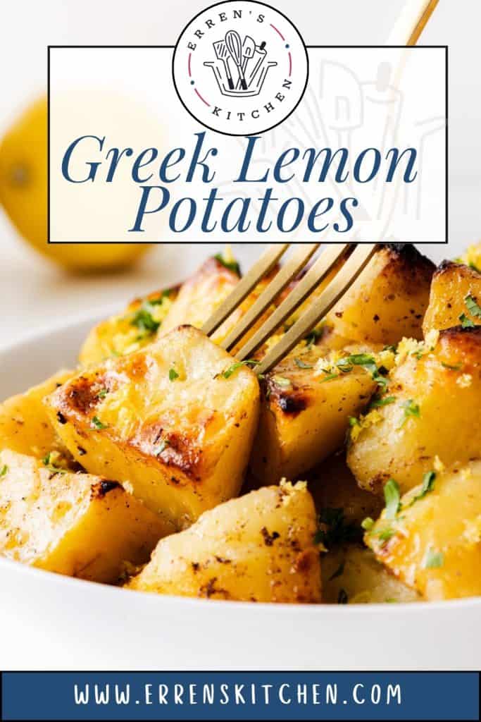 A fork spears a piece of golden, seasoned Greek Lemon Potato from a white bowl, garnished with herbs. Text reads "Greek Lemon Potatoes" and "www.errenskitchen.com".