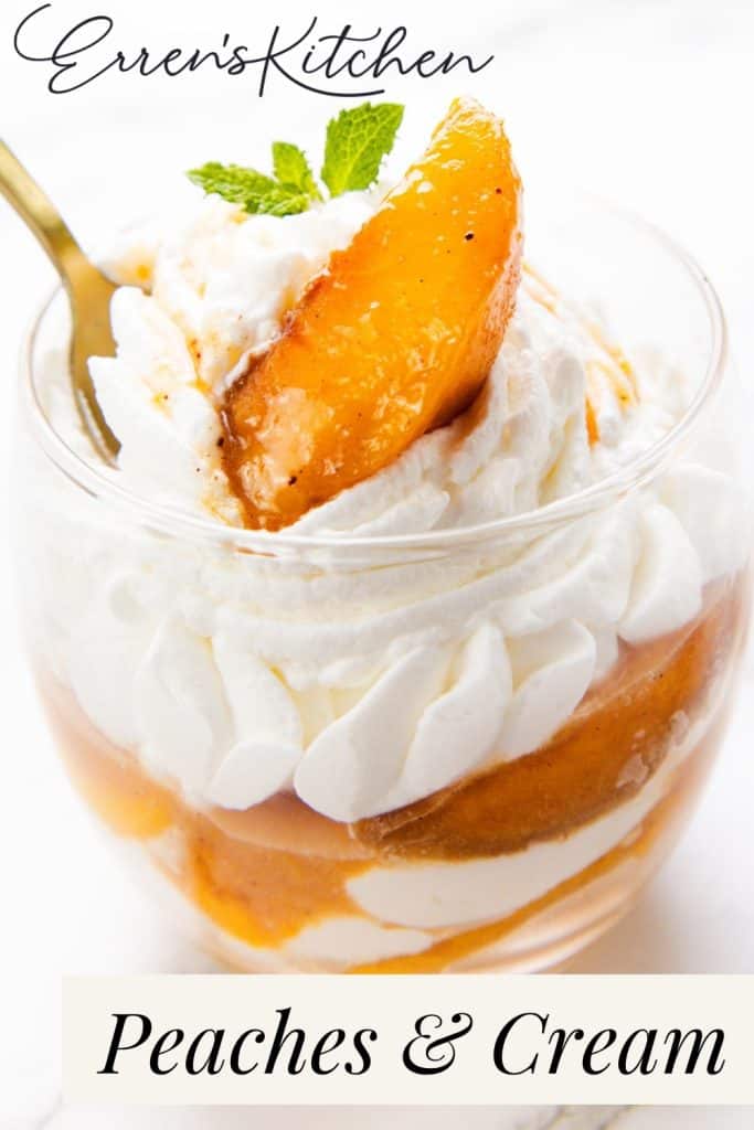 A glass cup filled with luscious whipped cream and juicy peach slices, garnished with a fresh mint leaf, captures the essence of classic Peaches and Cream. A gold spoon delicately holds a peach slice above the whipped cream. Text reads “Erren’s Kitchen” and “Peaches & Cream.”.